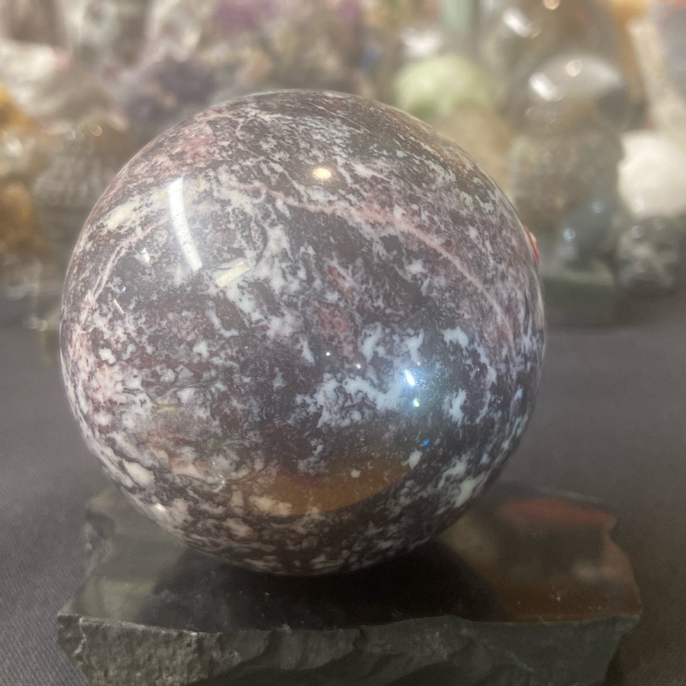 Beautiful purple and white and lavender lepidolite sphere 68 mm 391 g
